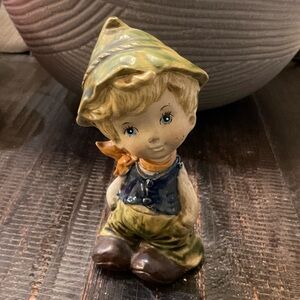 Charming Ceramic Boy Figurine with Green Hat